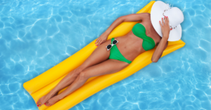 Woman with Smooth Skin After Laser Hair Removal Floating on Pool Raft
