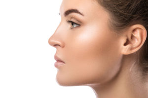 side view woman's face with clear skin