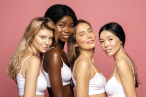 group of women of different ethnicities with clear skin