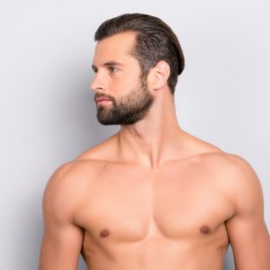 attractive shirtless man looking to the side