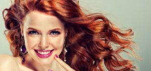 Woman with red hair smiling